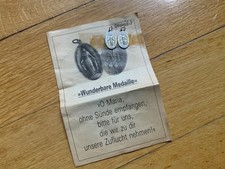 2 x geweihte Pilgermedaille